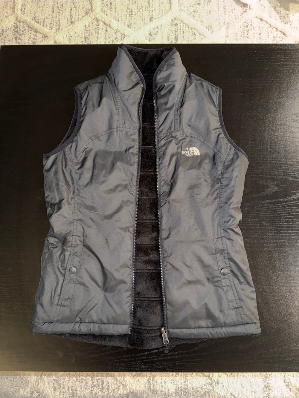 The North Face Black Reversible Insulated Puffer Vest with Fleece Lining